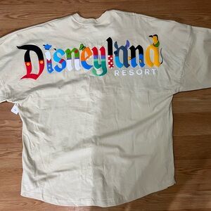 New With Tag Unisex Disneyland spirit jersey XL. Character themed letters.